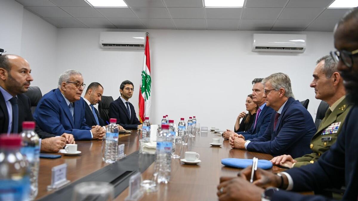 Jean-Pierre Lacroix speaks with representatives at a conference table.