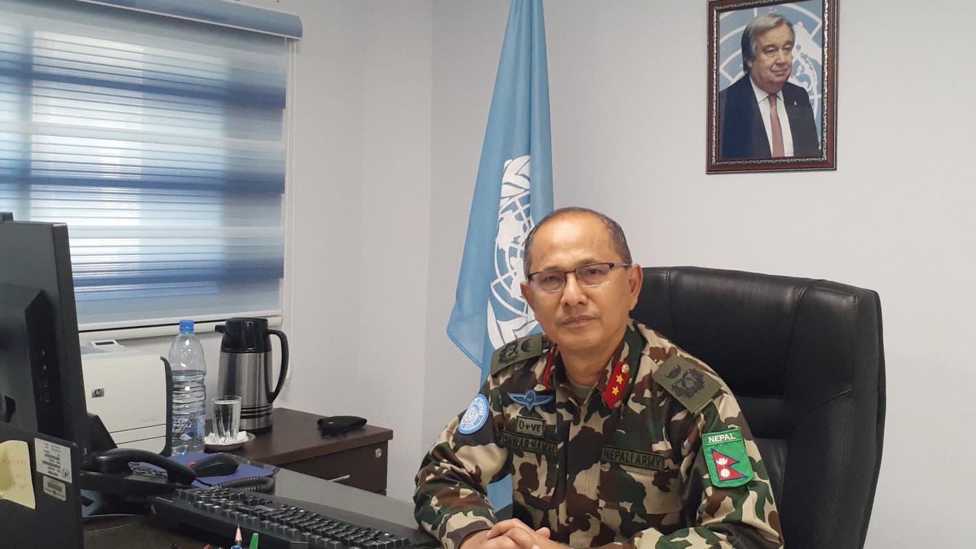 Force commander at their office