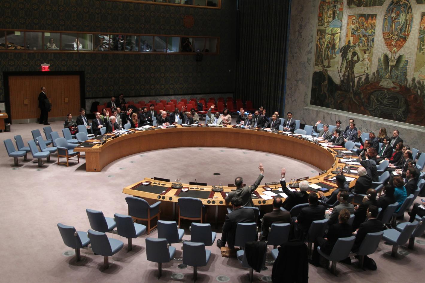 A view of the meeting, as Council members vote in favour of the draft resolution.